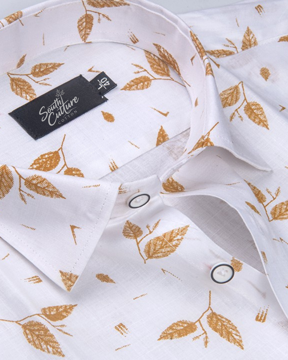 Turkey linen white with mustard-colored botanical leaf print