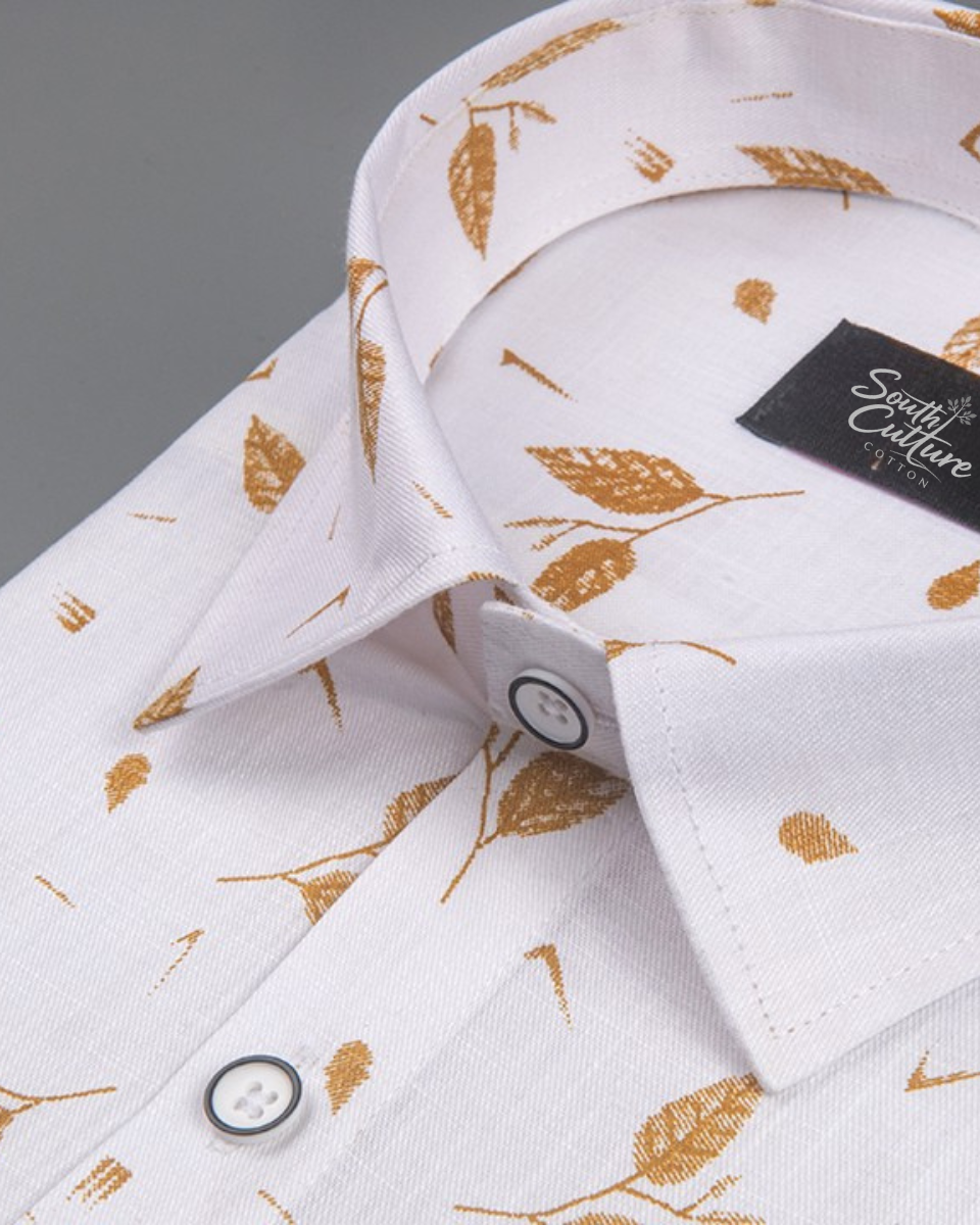 Turkey linen white with mustard-colored botanical leaf print